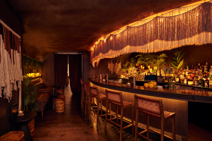 Bar beneath golden fringe lighting